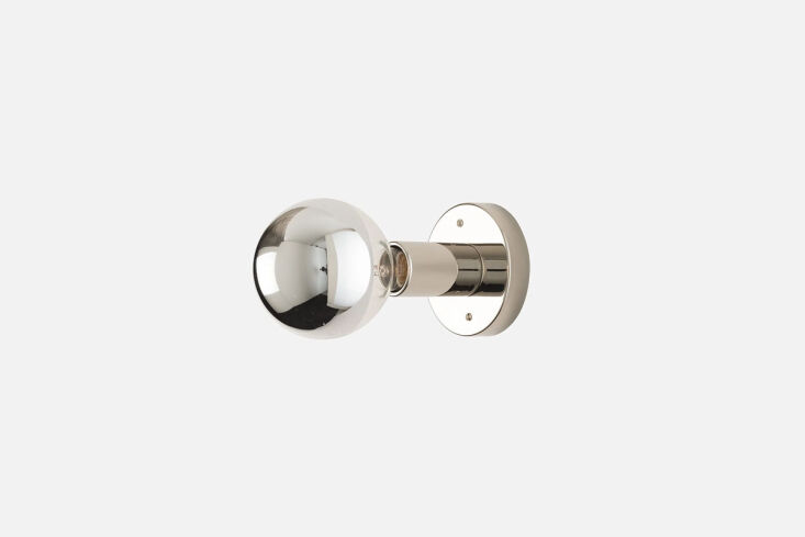 Close-up of a G25 Silver Tip LED Bulb showing the metallic coating on the top half.
