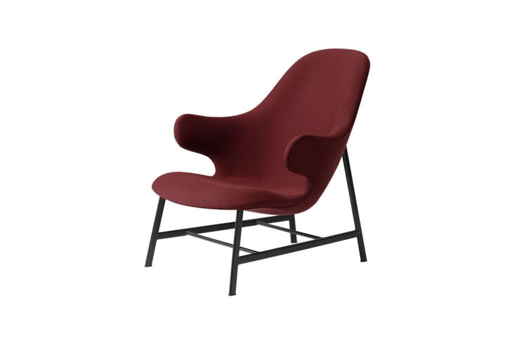 The &Tradition Catch JH13 Lounge Chair with its distinctive hugging shape and slim legs.