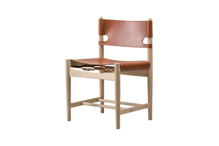 A Børge Mogensen Spanish Dining Chair in cognac leather and soaped oak.
