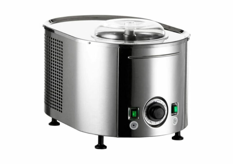 Stainless steel countertop ice cream maker with professional toggle switches and a clear lid.