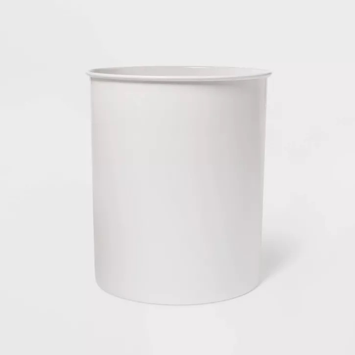 A simple, solid navy blue powder-coated steel wastebasket.