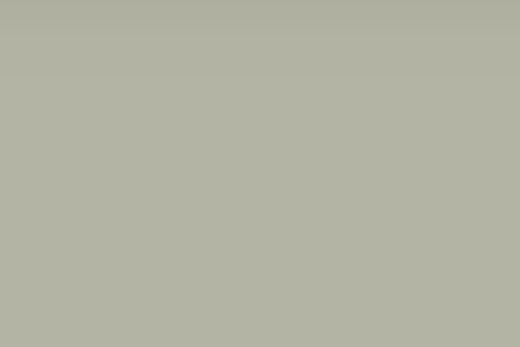 A wall section painted in a subtle Blue Gray shade that reflects local Greek stone.