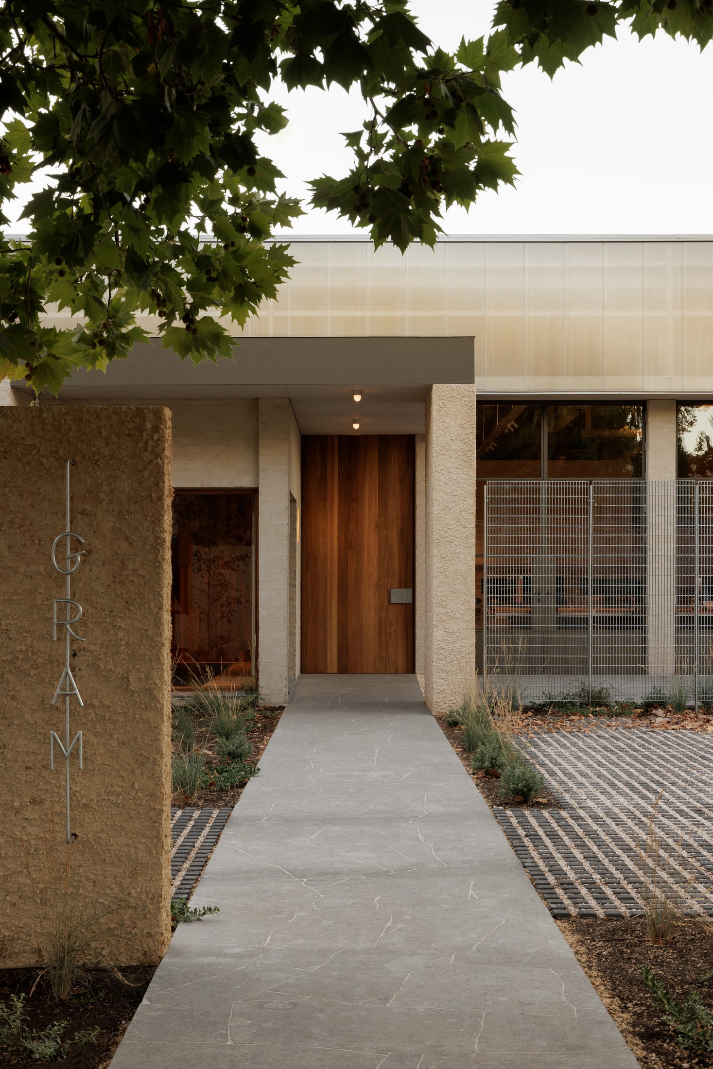 A minimalist and clean perspective of the studio's architectural lines and lighting.