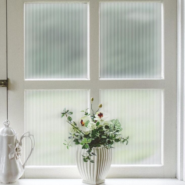 Velimax brand reeded glass window film applied to a bathroom window.