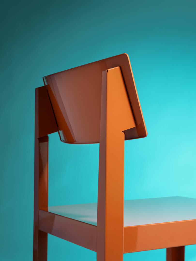 An orange Bishop chair with an angled backrest shown against a blue gradient background.