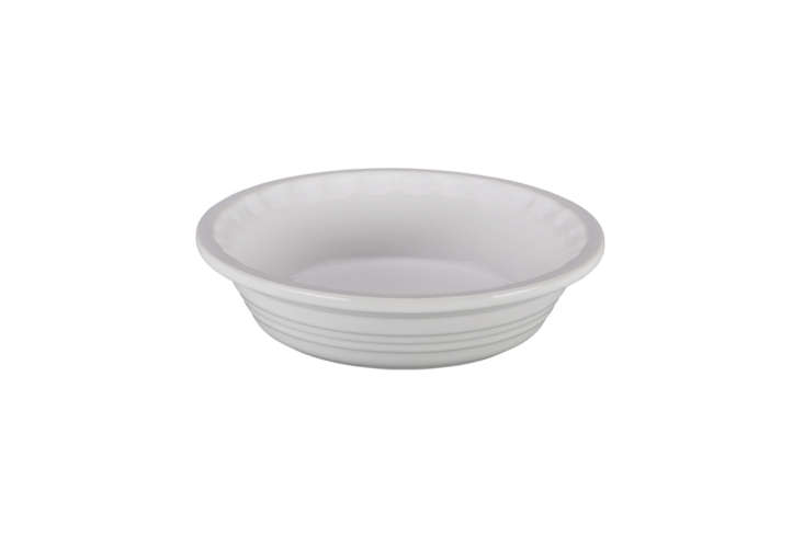 A classic Le Creuset Heritage Pie Dish with scalloped edges.