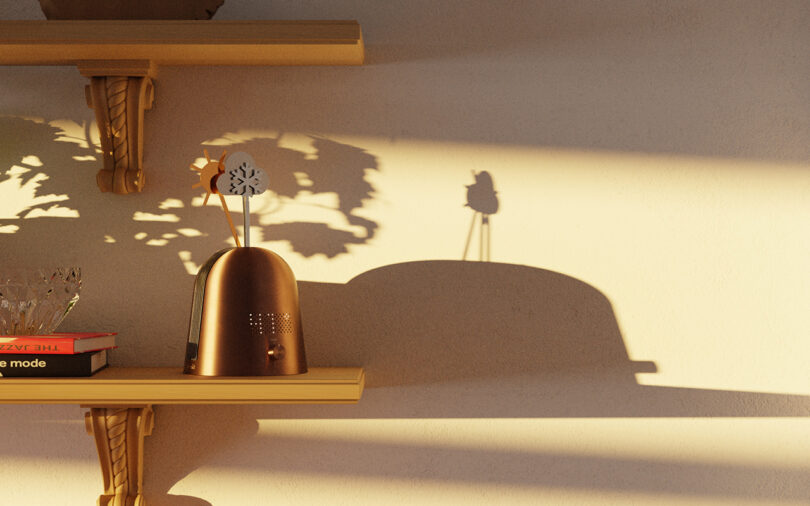 Skymill and books on a wooden shelf casting long shadows on a sunlit wall.