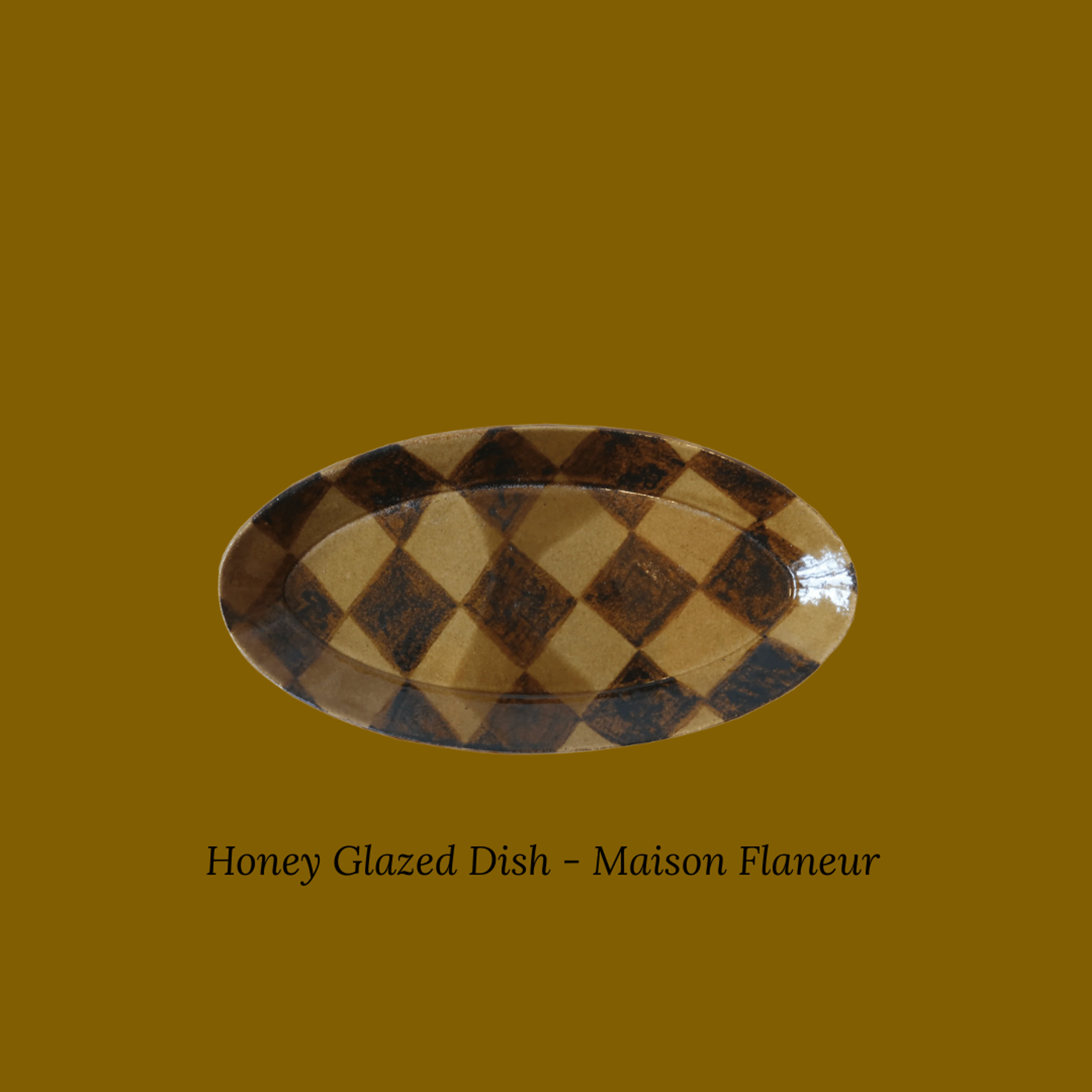 A minimalist covered ceramic serving dish in an earthy, matte finish.