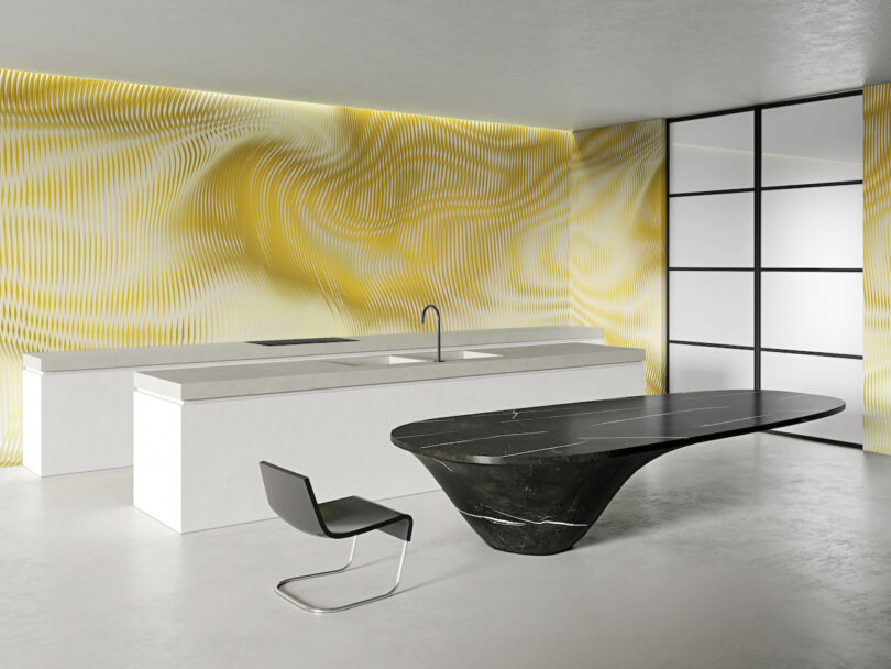 Modern white kitchen with a black island and a vibrant yellow and white abstract patterned accent wall.