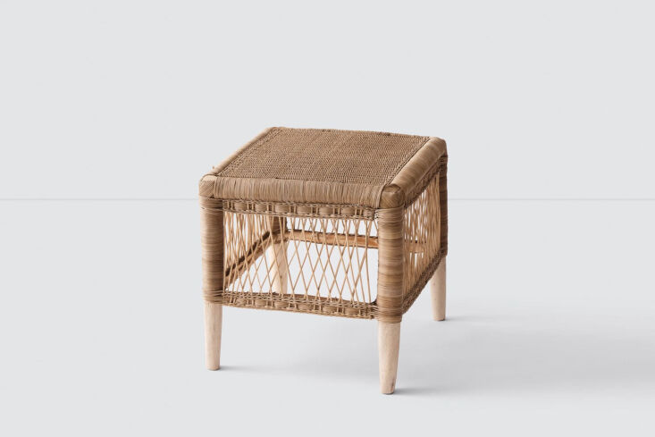 A woven stool with a traditional Moroccan design.