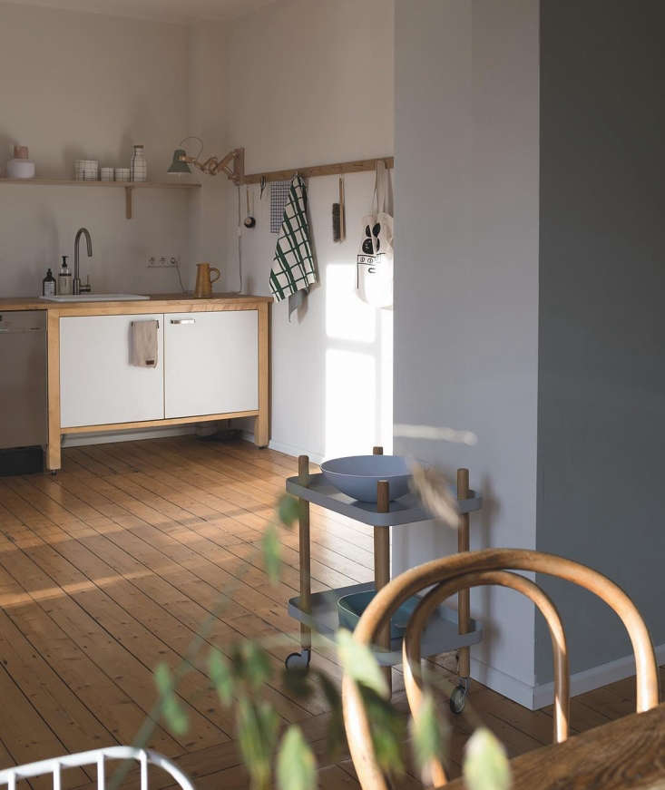 Two IKEA Värde units connected by a continuous IKEA butcher block counter with a sink inset.