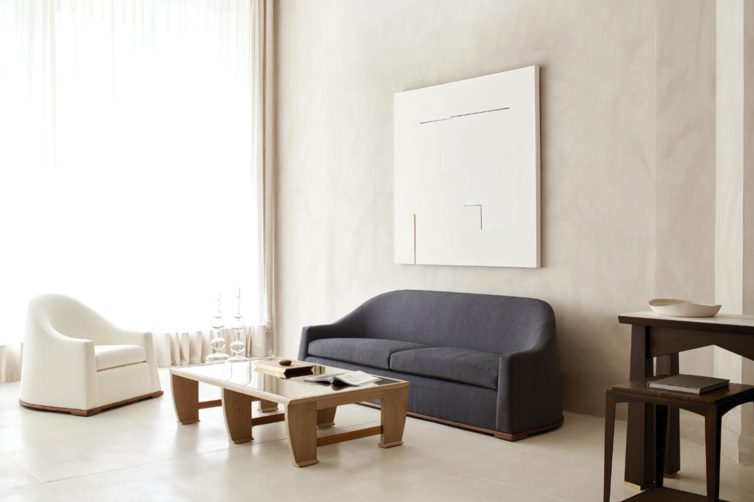 The Milano Sofa from Dmitriy & Co with an elegant, sweeping curved silhouette.