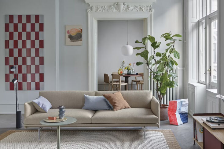 The Muuto Outline 2-Seater Sofa with slim metal legs and arms.