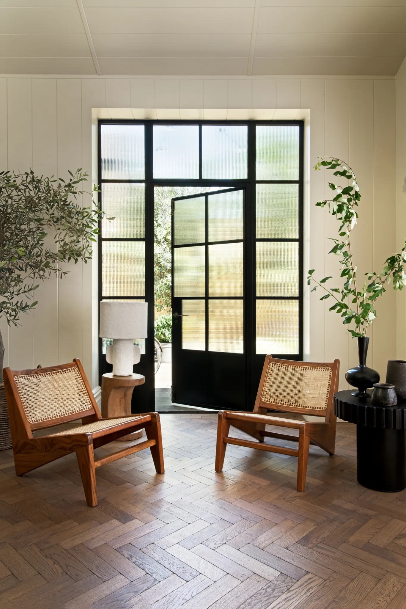 Reeded glass window film providing privacy while allowing natural light to filter through.
