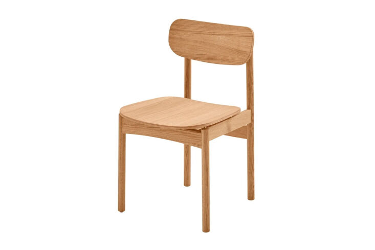 The Skagerak Vester Chair in oiled oak featuring brass hardware details.