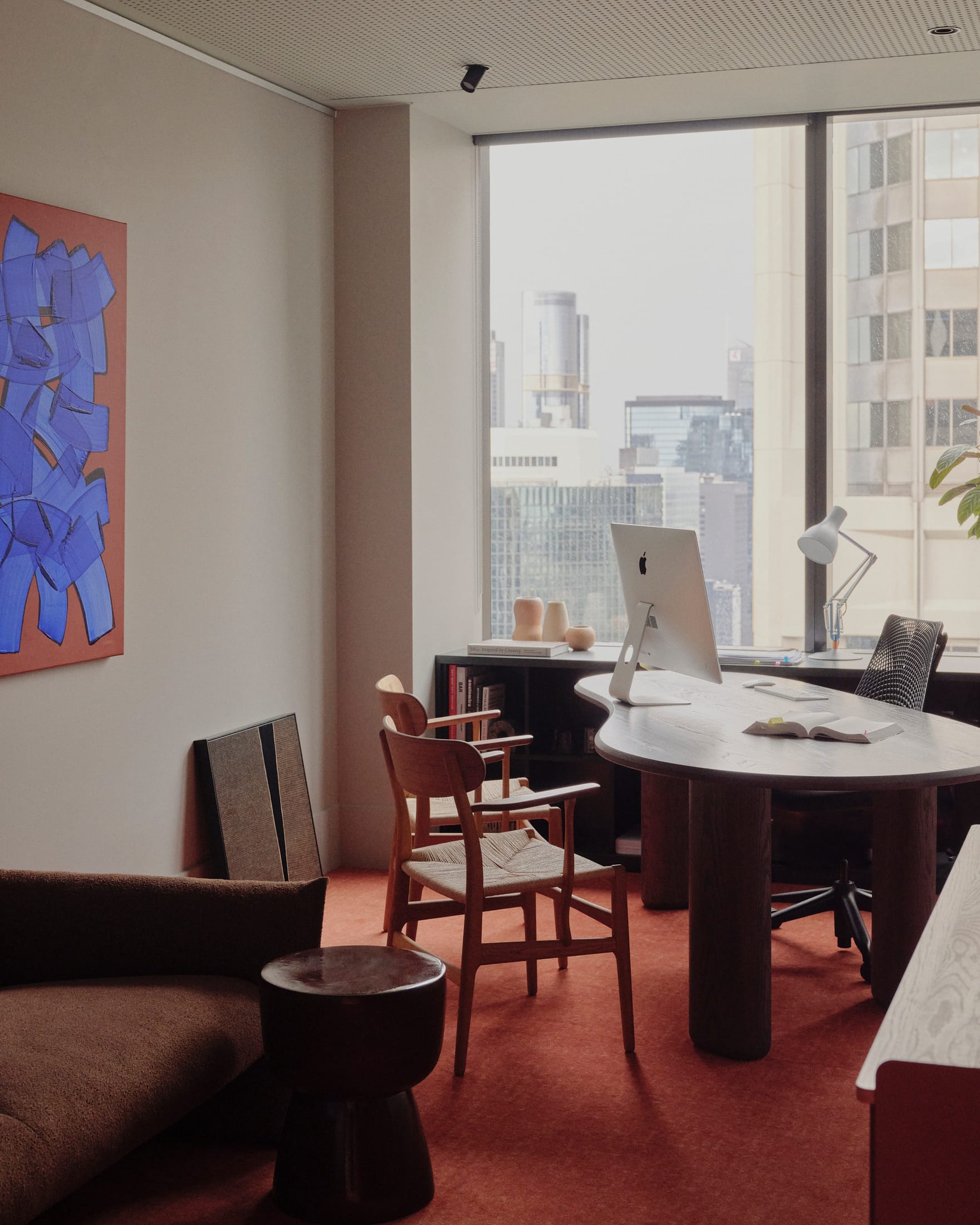 A shared amenity space featuring high-end design elements and a communal layout.