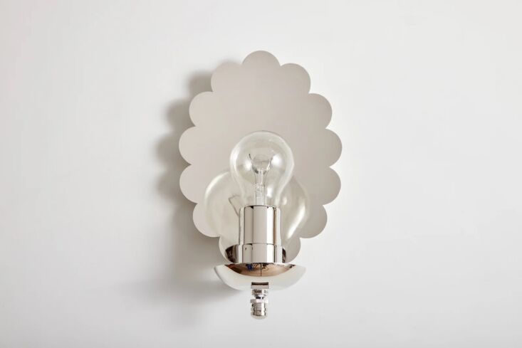 The Scallop Sconce in a silver-toned nickel finish.