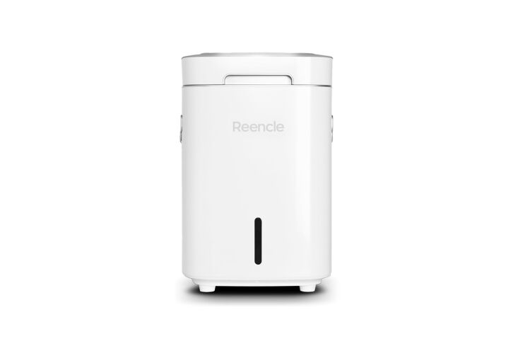 A Reencle Home Composter unit featuring a minimalist design suitable for apartments.