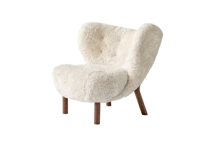 Viggo Boesen's Little Petra Lounge Chair in white sheepskin with short walnut legs.