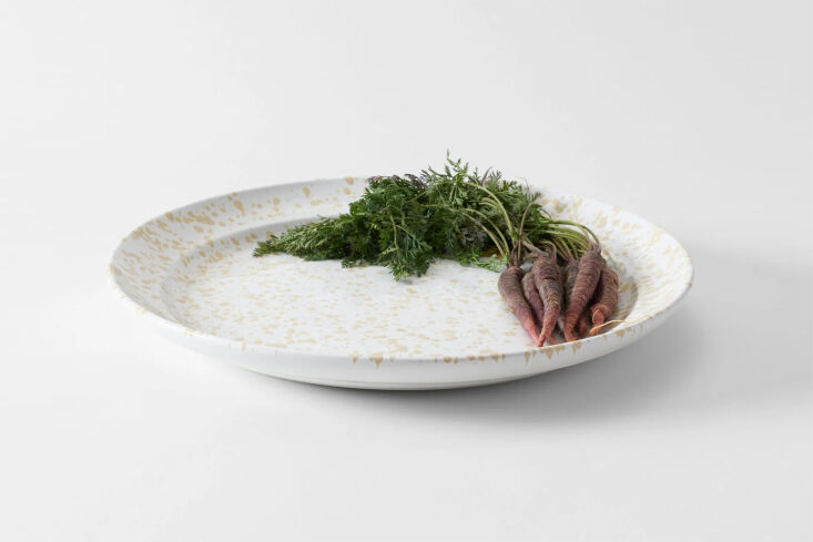 Large 20-inch Italian splatterware platter with cream and white patterns.