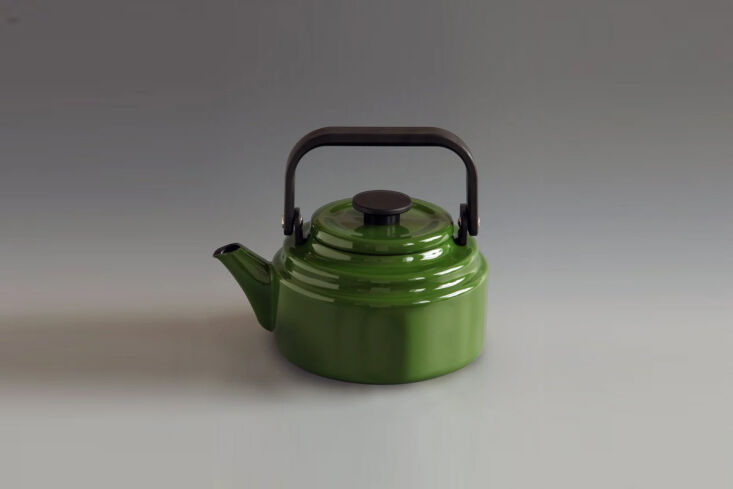 A minimalist green Japanese enamel teakettle with a black handle.
