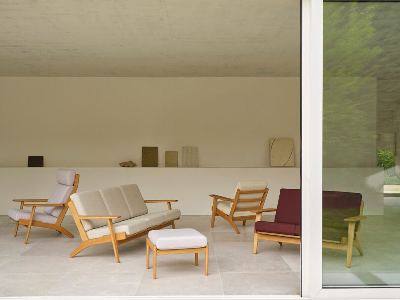 A minimalist living room arrangement featuring the CH290 series against a white wall with neutral decor.