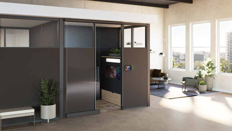 The Ocular View pod integrated into an open-plan office with soft, warm lighting.