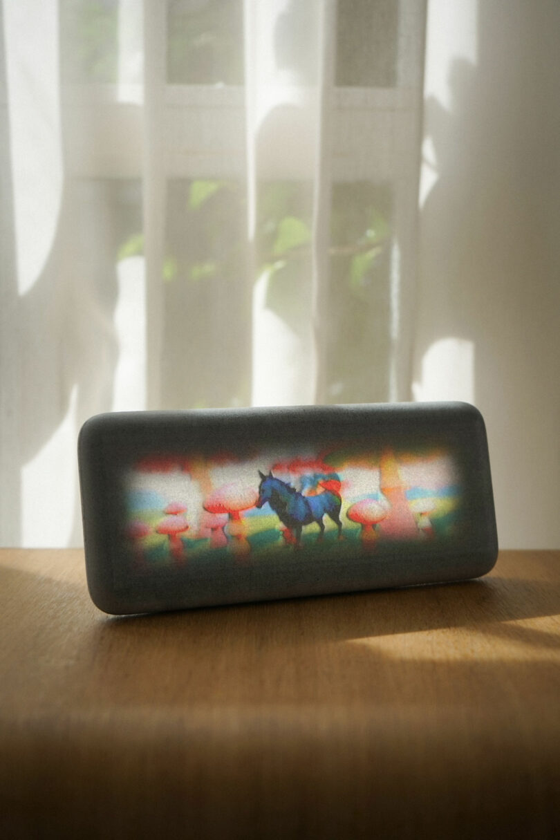 The Dream Recorder screen displaying a surreal image of a unicorn and mushrooms.