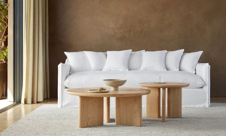 A white Maiden Home Dune Sofa in a minimalist living room setting.