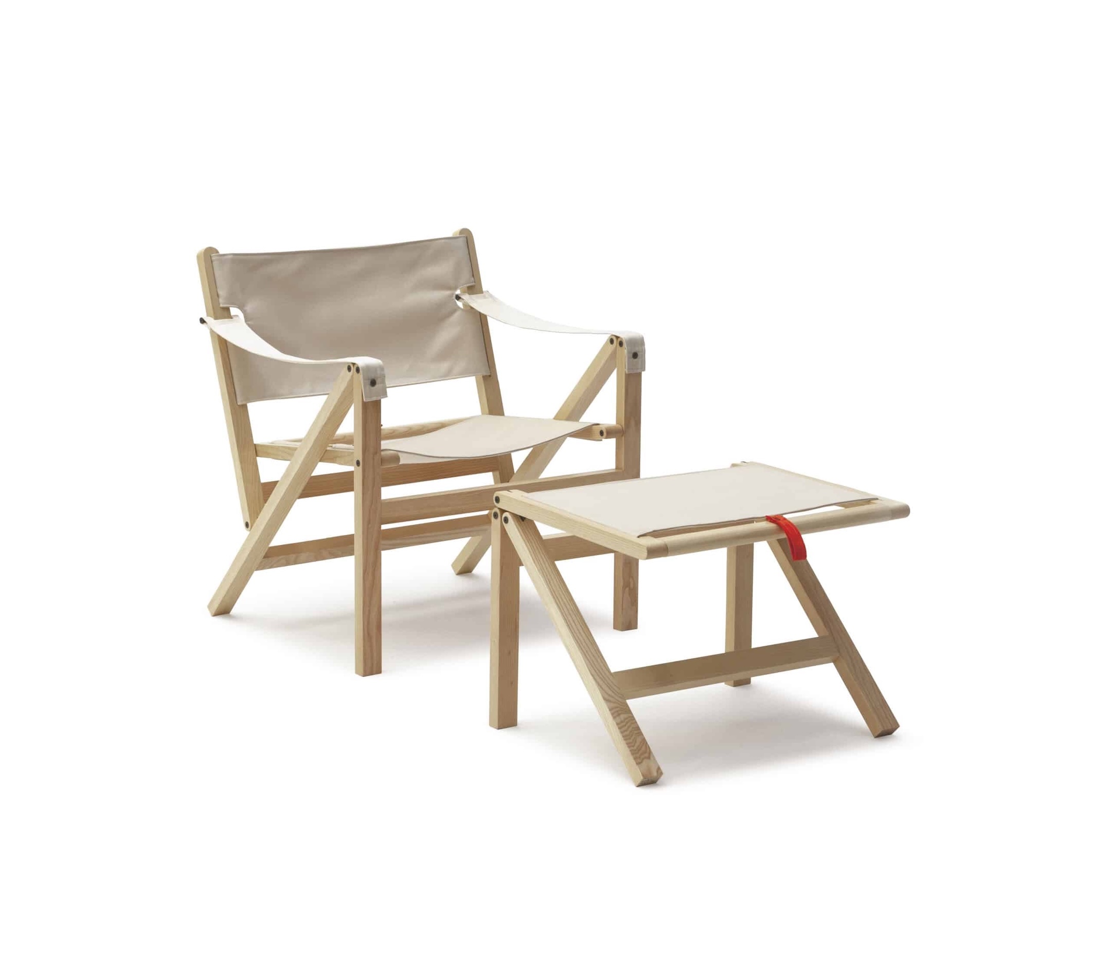 Davide Biancucci’s Mehari safari chair and matching ottoman made of varnished ash and white canvas.