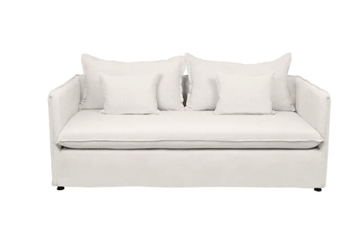 The Caravane Holi Sofa in a neutral fabric, suitable for a compact living space.