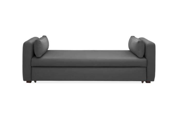 The Room & Board Oxford daybed with a pop-up mechanism that creates a larger sleeping platform.