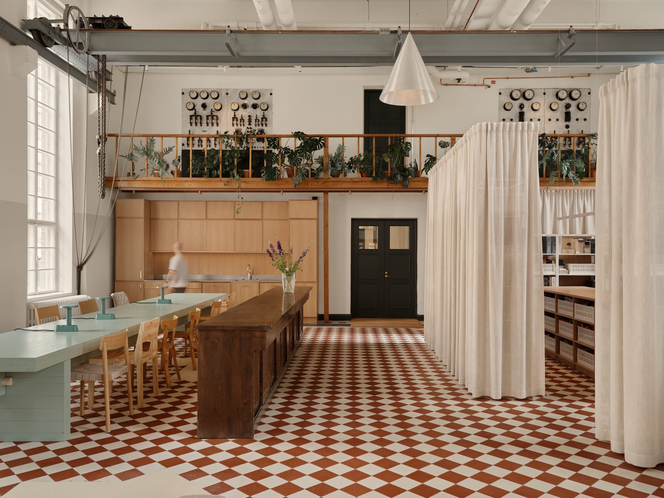 A close-up of the ABL-Laatat showroom featuring ceramic tiles and architectural details.