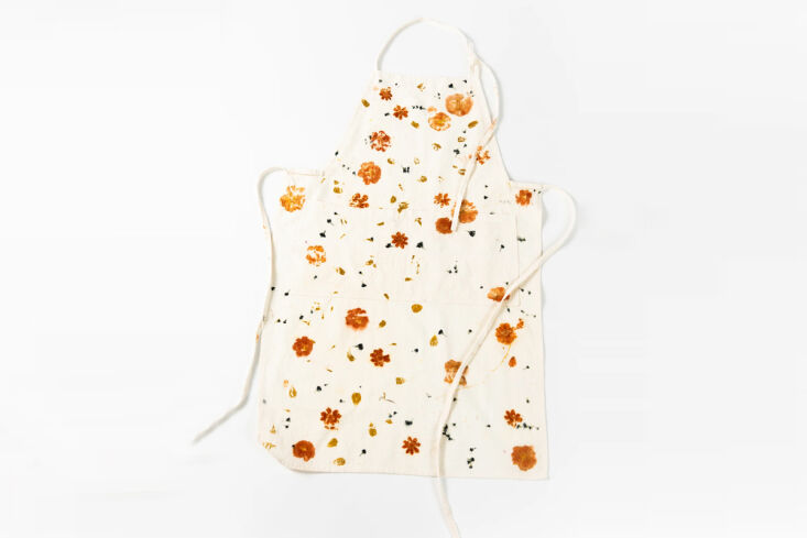 Linen fabric featuring delicate, one-of-a-kind pressed-flower designs.