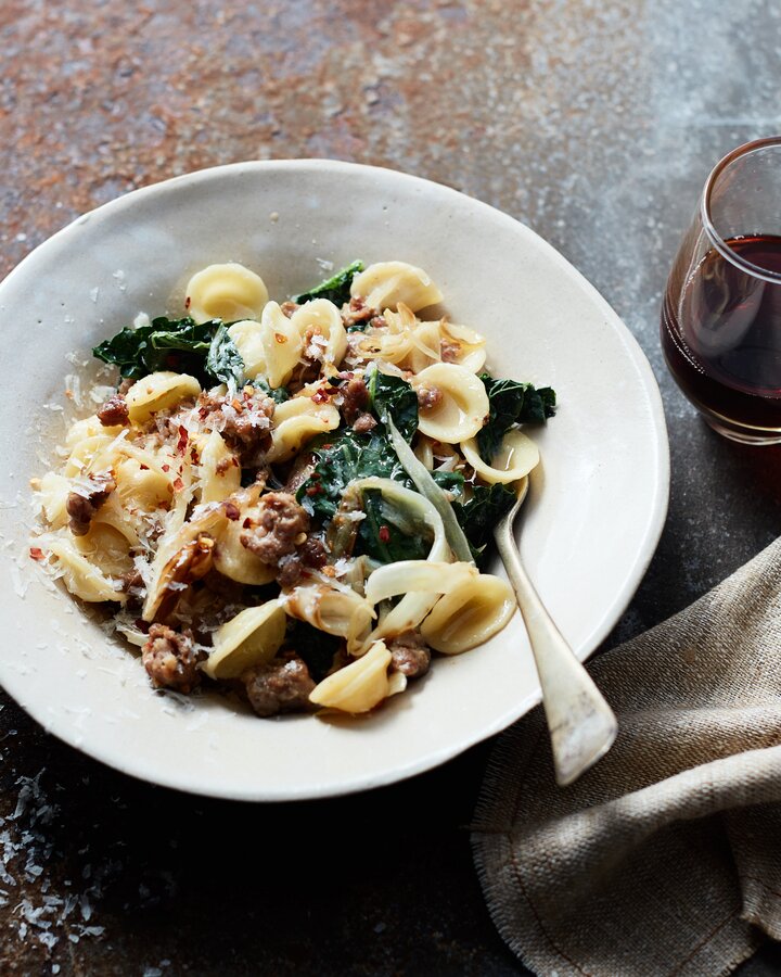 Orecchiette pasta mixed with sautéed kale and crumbled sausage.