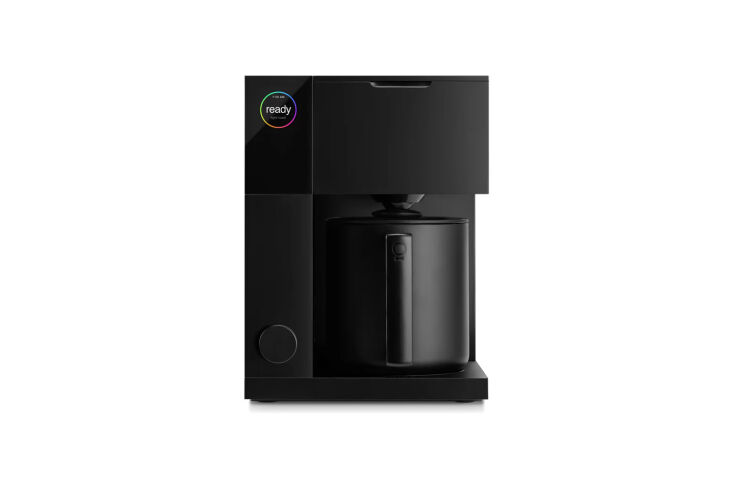 Fellow Aiden Precision Coffee Maker with a sleek black exterior and digital interface.