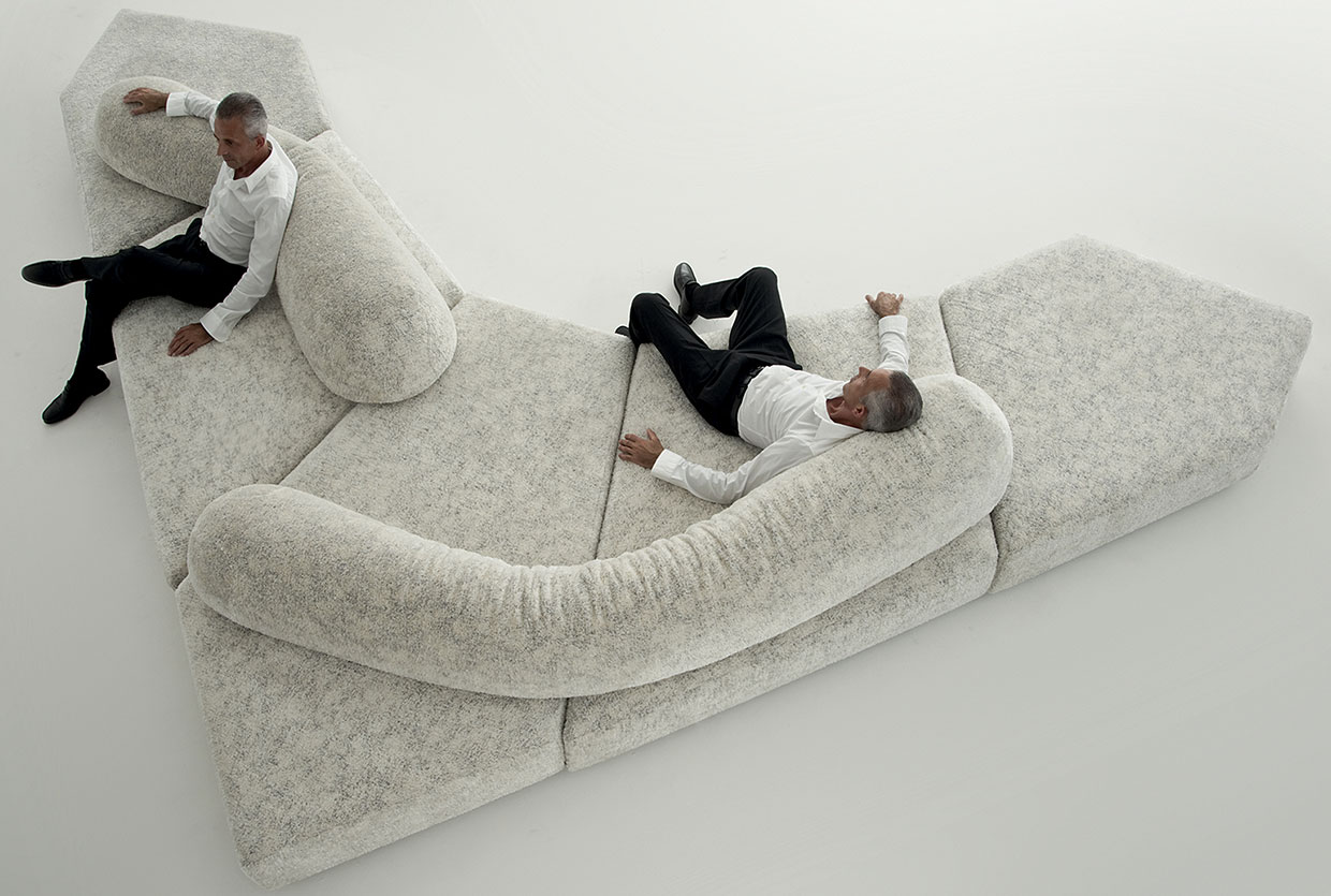 An arrangement of several iconic 1970s-style modular sofas showcasing different textures and colors.