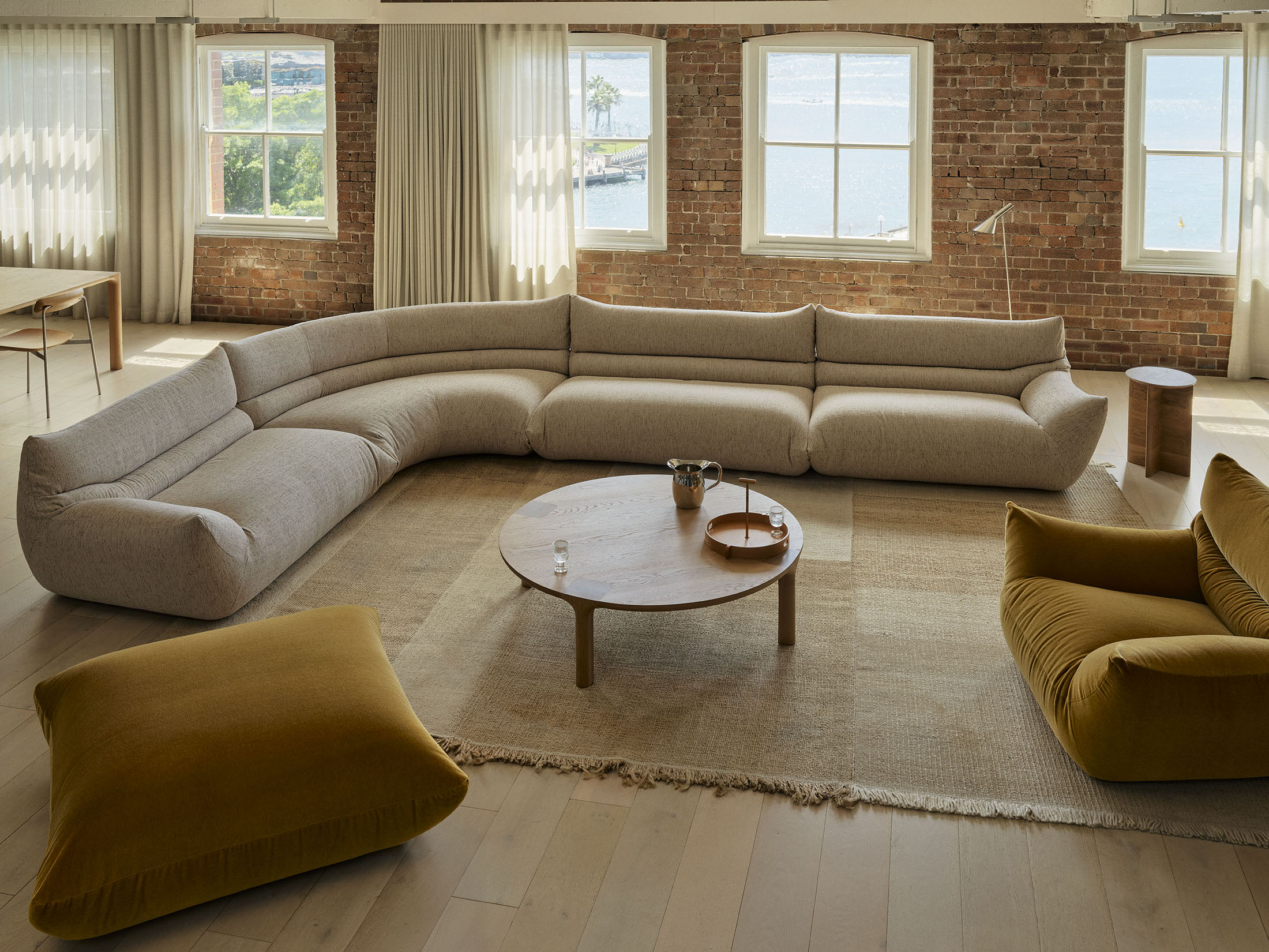 A collection of NAU brand icons including the Billo sofa and Molloy coffee table.