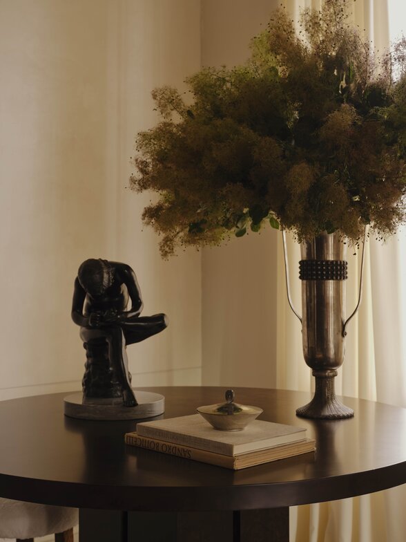 The central architectural cube in the studio featuring Vetra glass blocks and walnut trim.