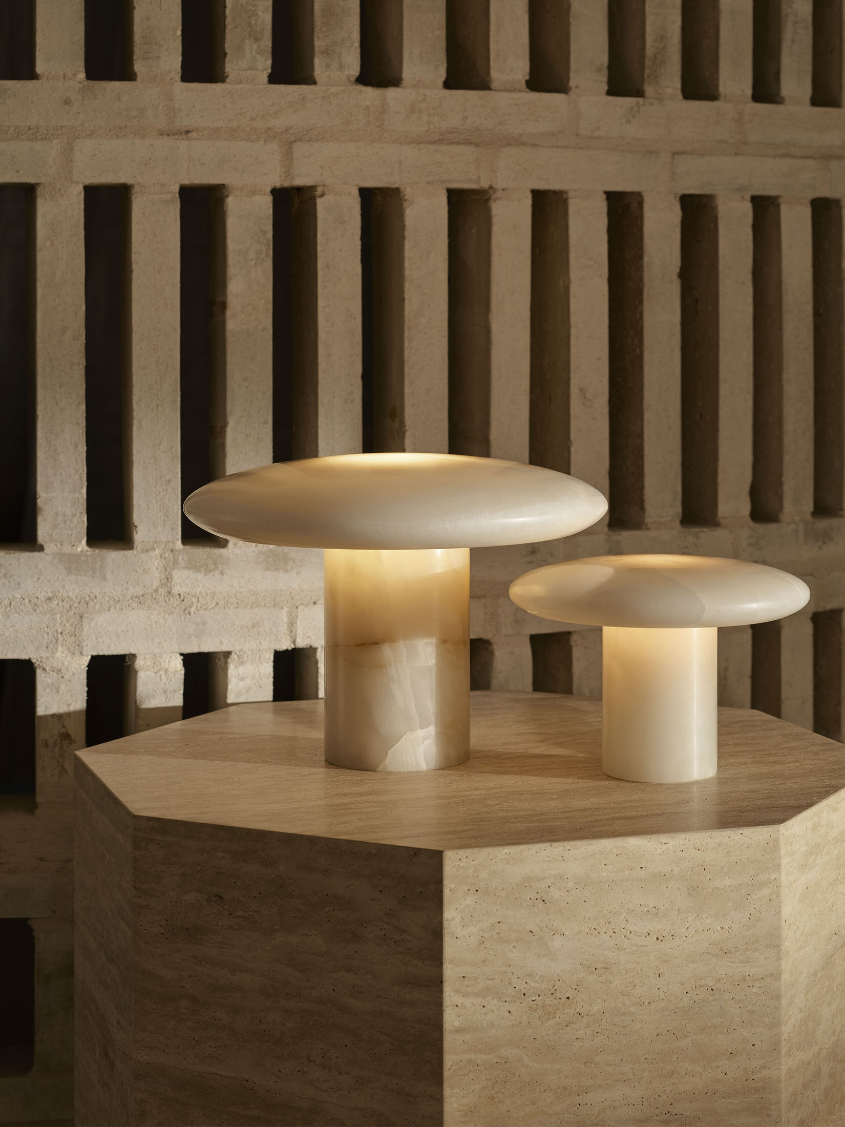Close-up of the Nola table lights featuring hand-cast glass and solid stone bases.