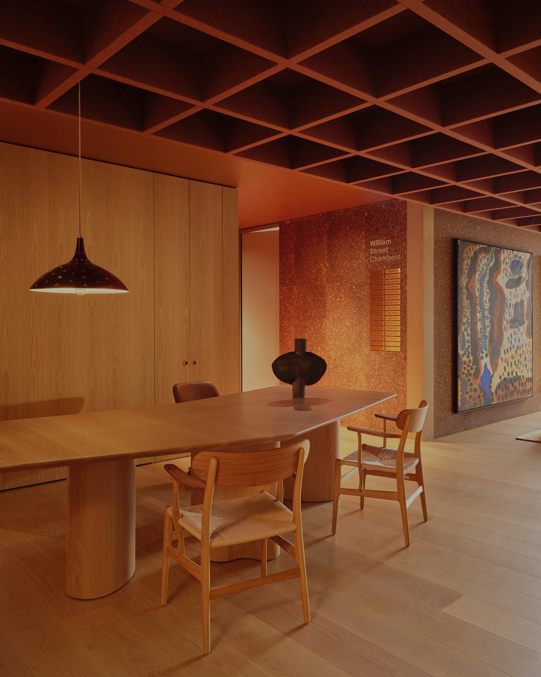 A close-up of the textural materials and vibrant color palette used in the law office fit-out.