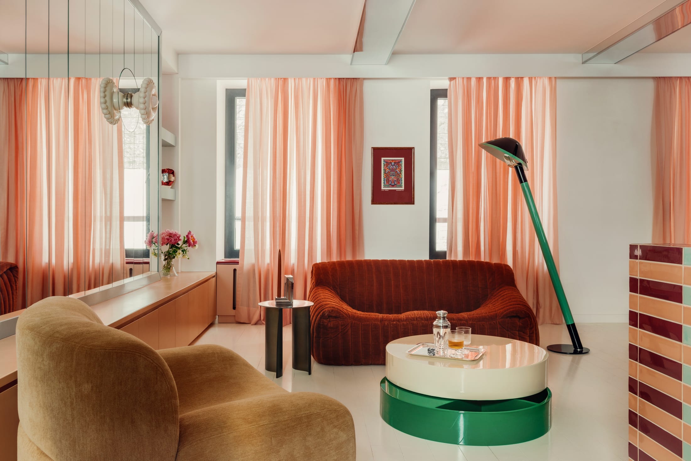 An angled view of the apartment's interior showing the harmony between different color zones.