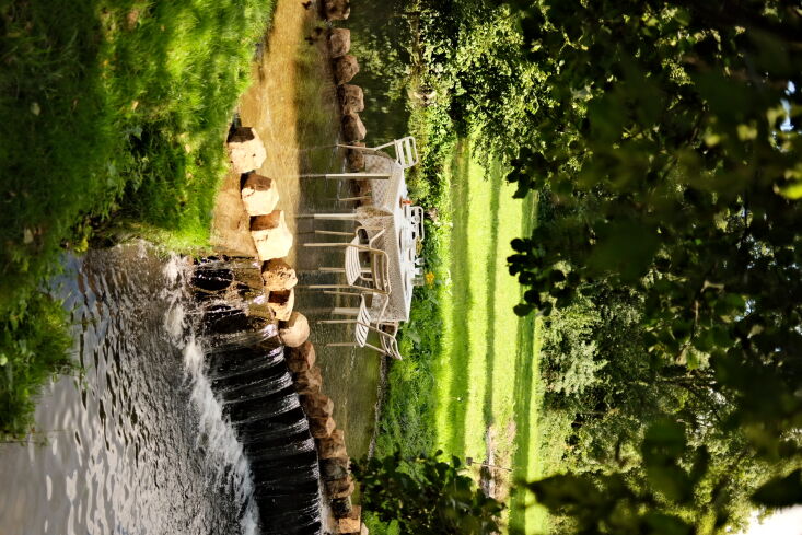 An outdoor dining setup in the orchard for a long, barefoot lunch.
