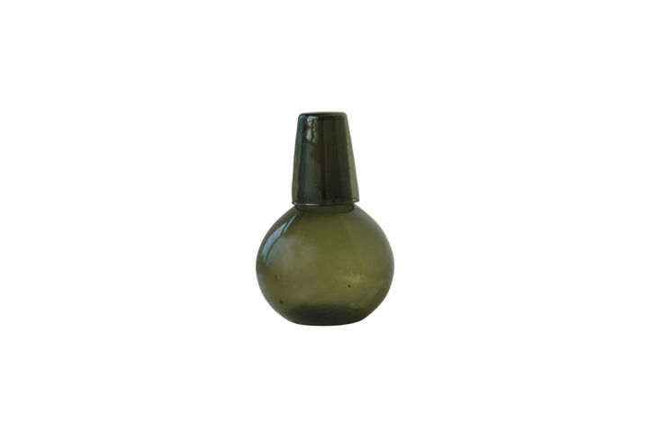 A clear glass bedside carafe set with a simple, elegant design.