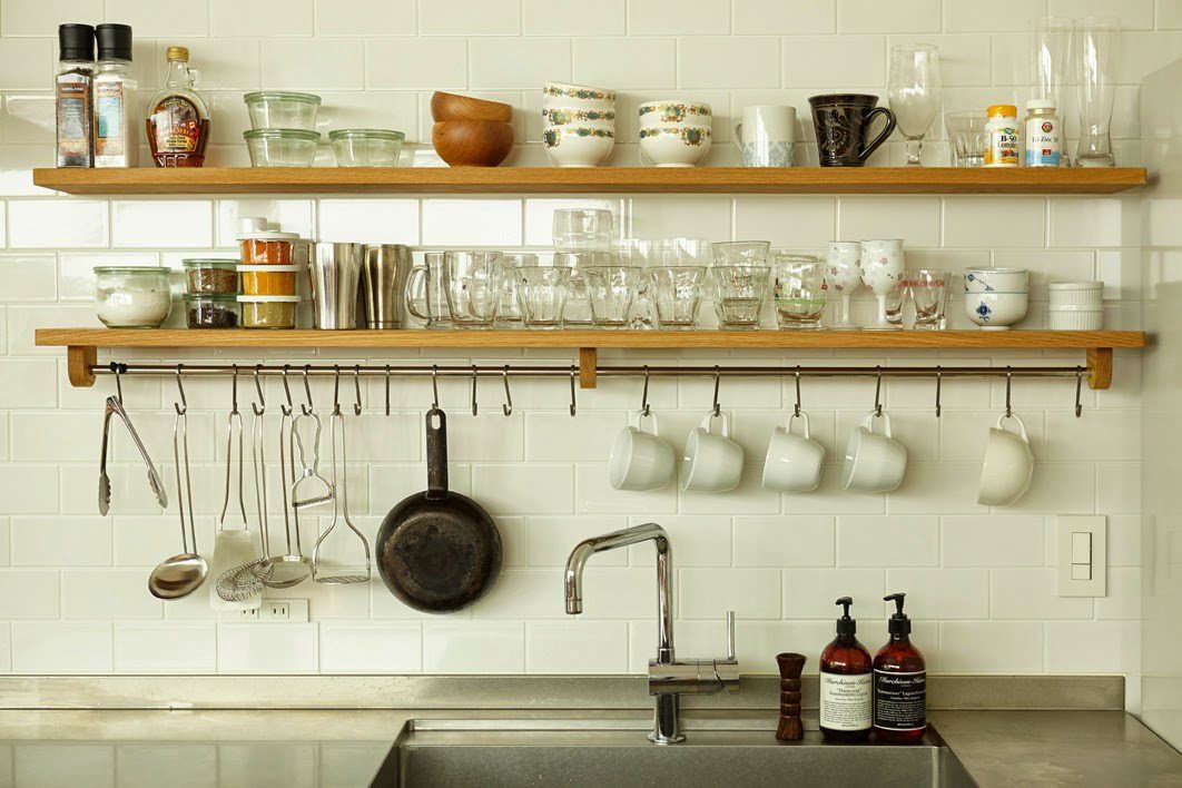 A finely tuned modern kitchen in Kobe showcasing extensive use of traditional joinery.