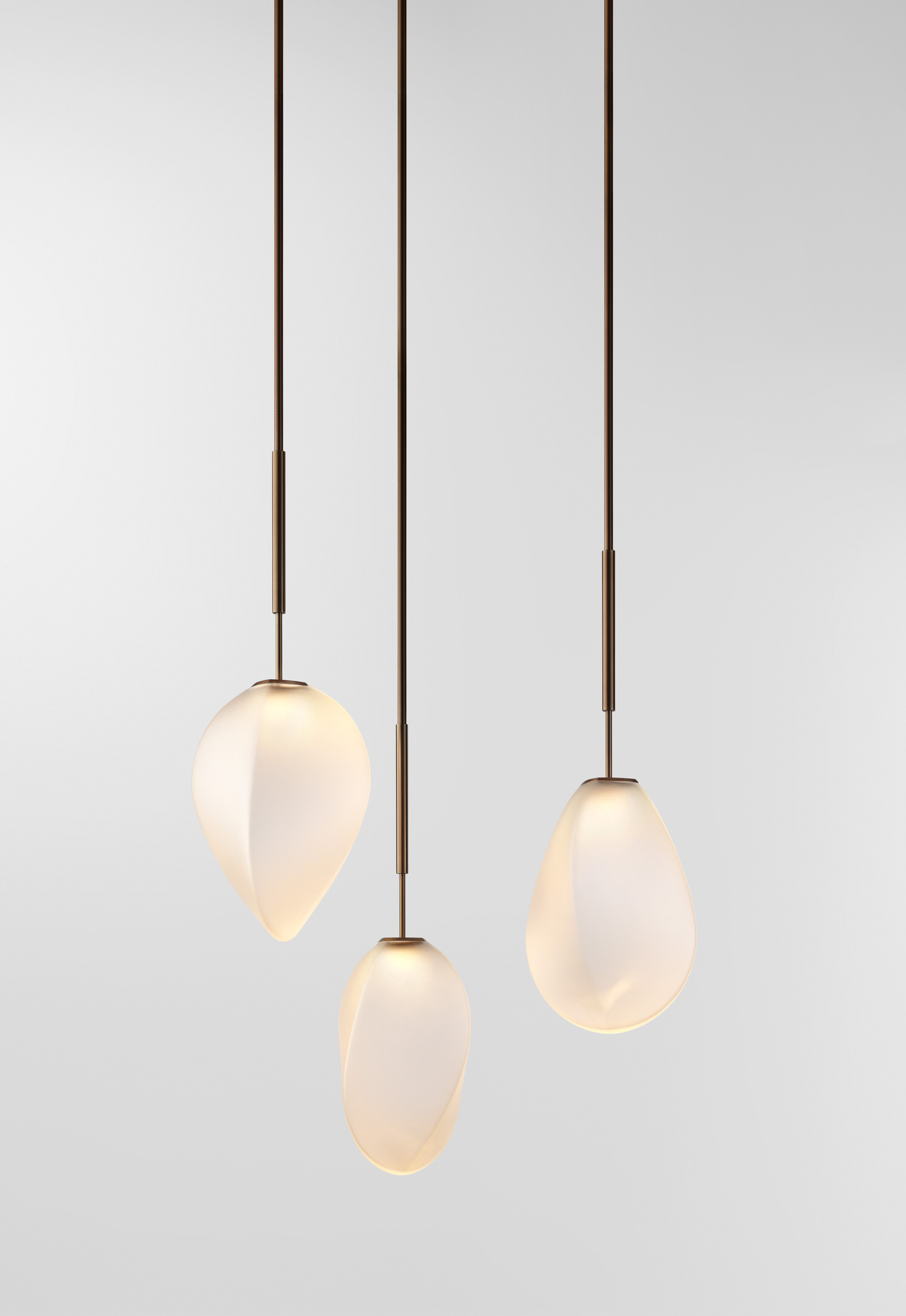 Solace collection lighting fixtures showing the perpendicular intersection of glass circles.