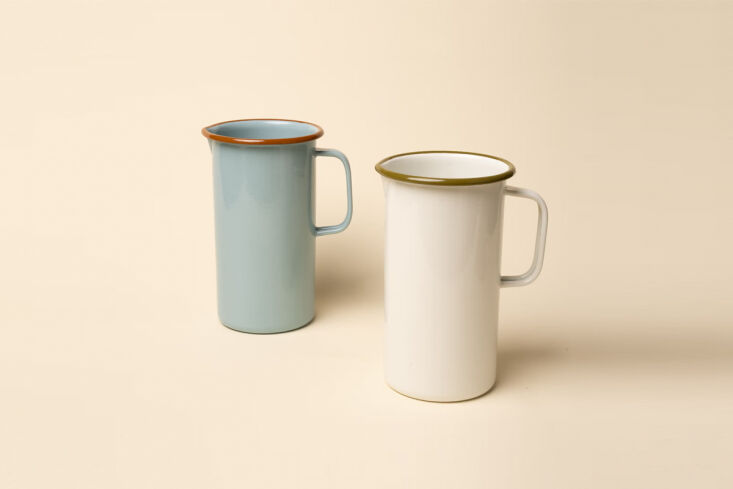 A collection of colorful, lightweight enamelware dishes and bowls.